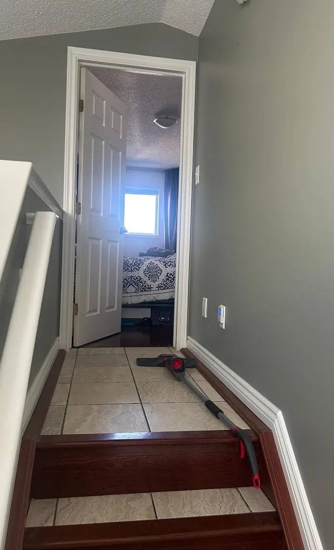 Interior finish work with a painted feature wall — Leonard’s Painting, Edmonton area