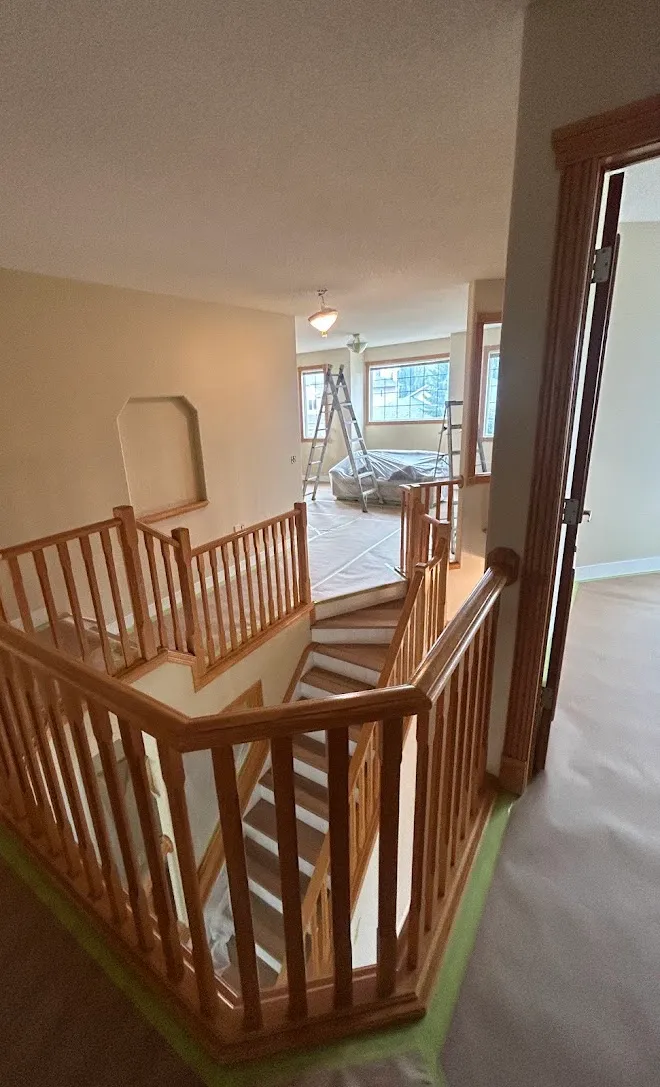 Refinished stair railings and spindles — Leonard’s Painting, Edmonton area