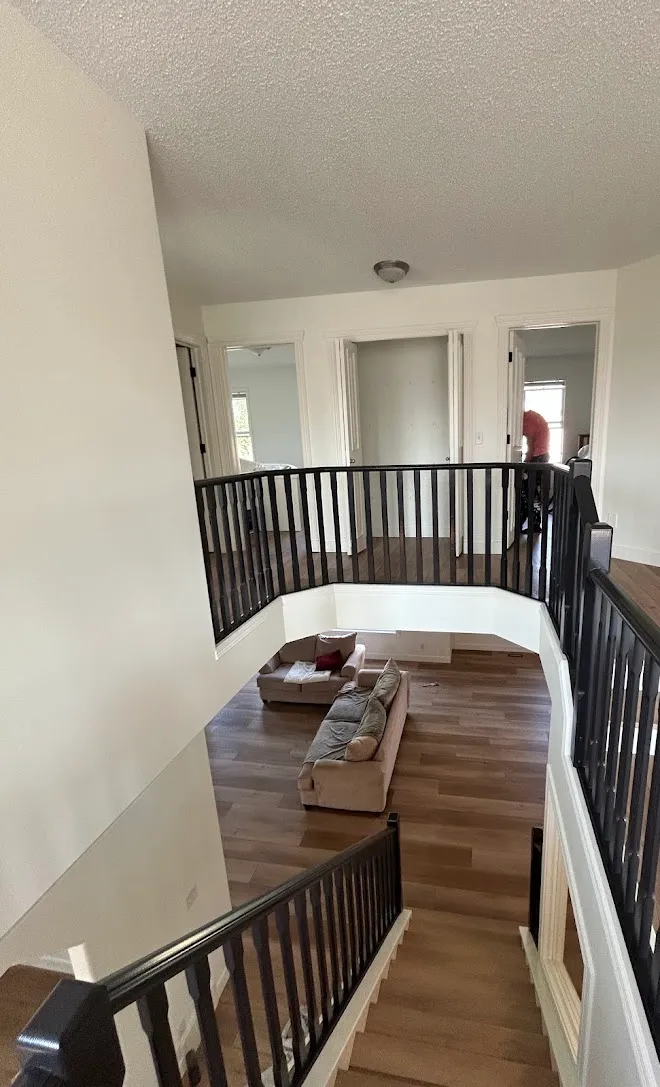 Repainted living space with clean lines and even coverage — Leonard’s Painting, Edmonton area
