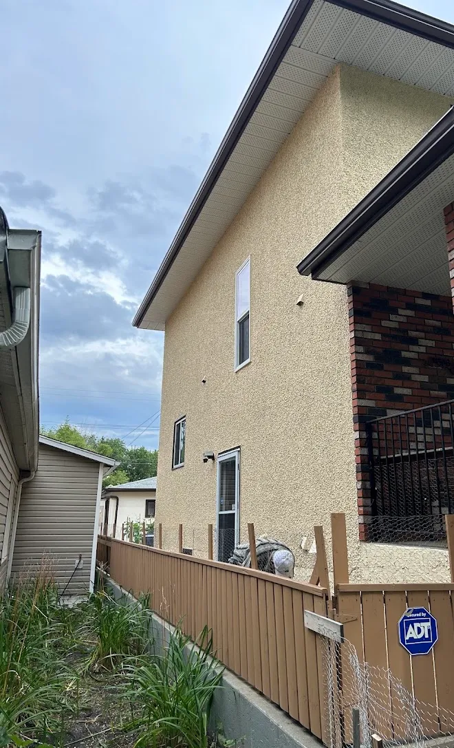 Home exterior with a fresh coat of paint — Leonard’s Painting, Edmonton area
