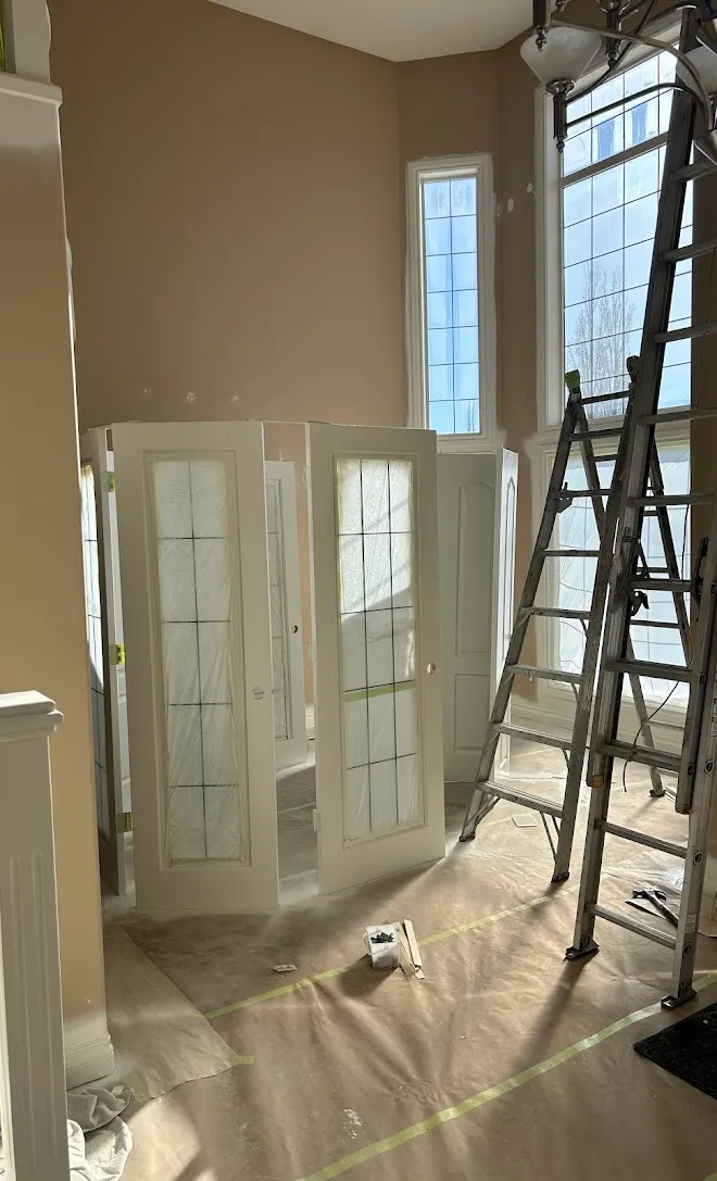Interior doors and trim with a smooth painted finish — Leonard’s Painting, Edmonton area