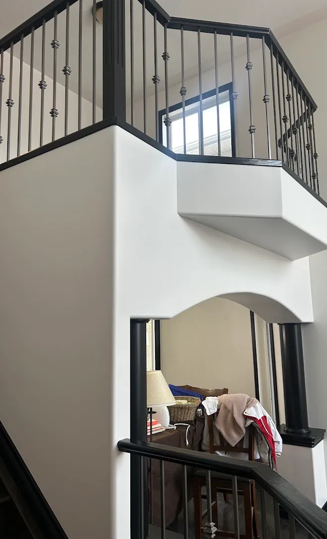 Interior finish work with a painted feature wall — Leonard’s Painting, Edmonton area