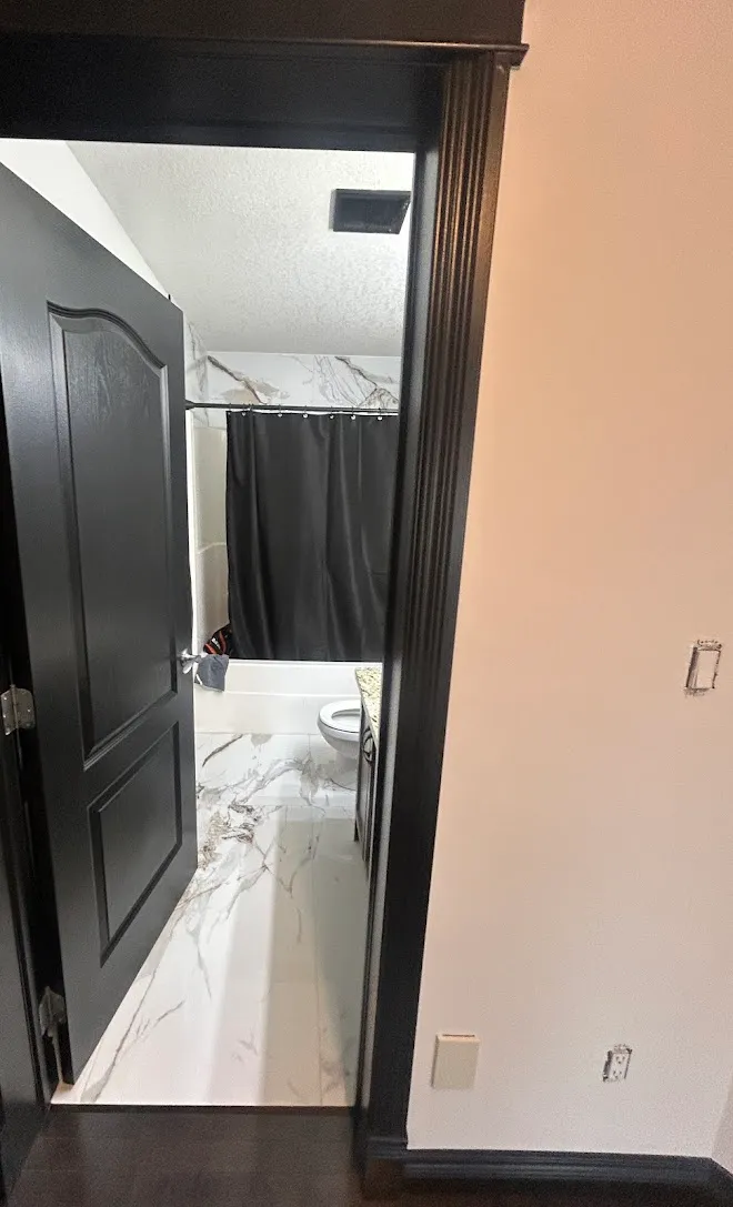 Interior door and casing finish work — Leonard’s Painting, Edmonton area
