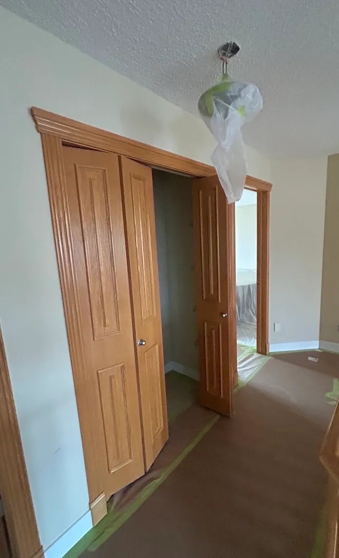 Interior doors and trim with a smooth painted finish — Leonard’s Painting, Edmonton area