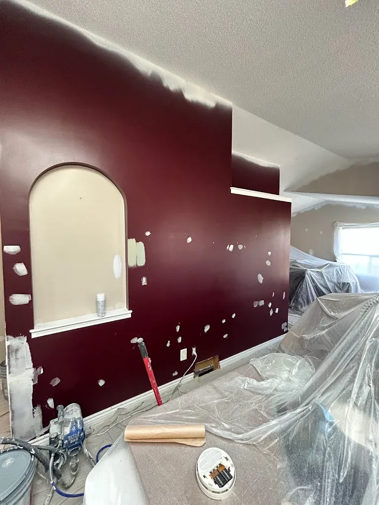 Freshly painted interior walls and ceilings, masked and prepped mid-project — Leonard’s Painting, Edmonton area